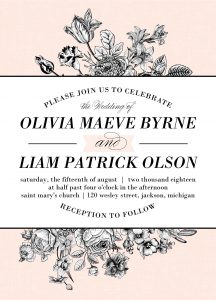 A contemporary wedding invitation with a bouquet of flowers.