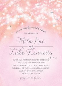 Pale pink twinkle wedding invitation.