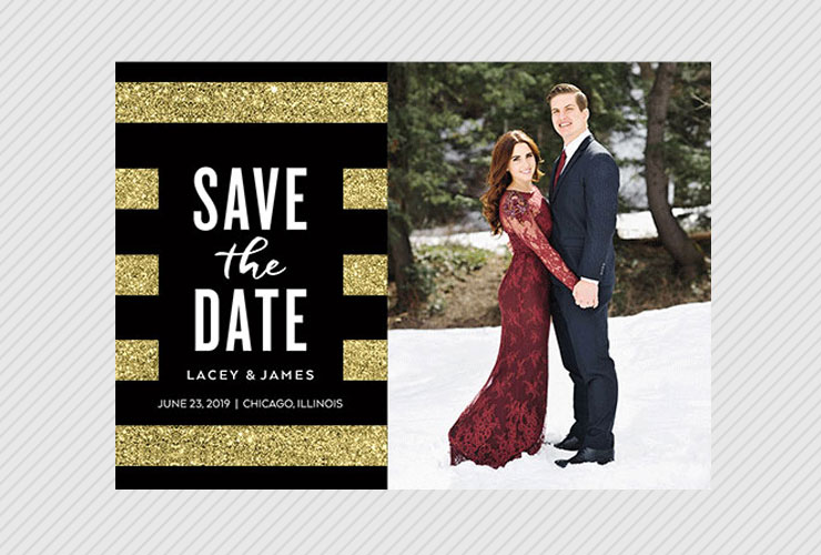 Couple in formalwear in snow on save the date