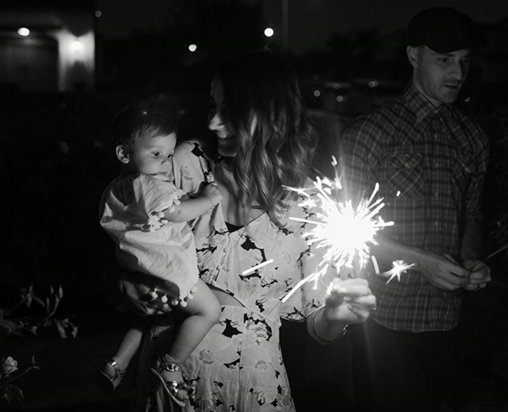 baby and mom with sparkler