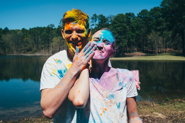 Couple posing after a paint fight