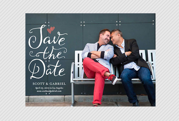 Gay couple sitting on bench