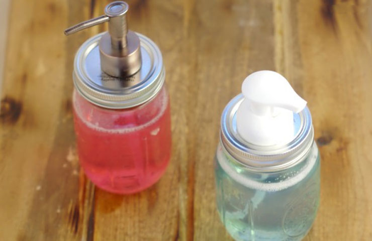 soap pump attached to mason jars