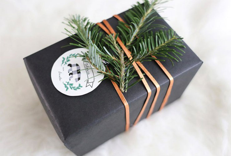gift wrapping idea with evergreen