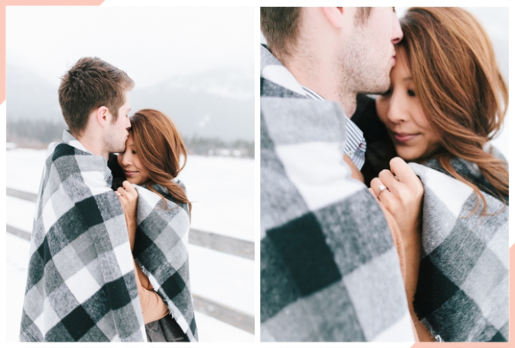 blanket in the snow engagement photo idea