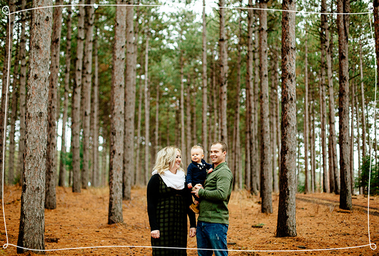 Family of three in the woods