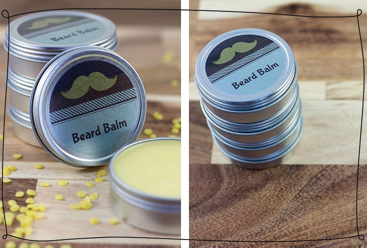 Tins of beard balm are stacked on a table