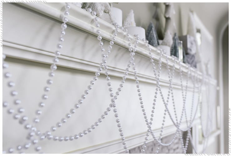 Strung pearls on mantel