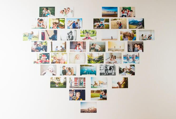 Photos are arranged in a heart shape in a frame