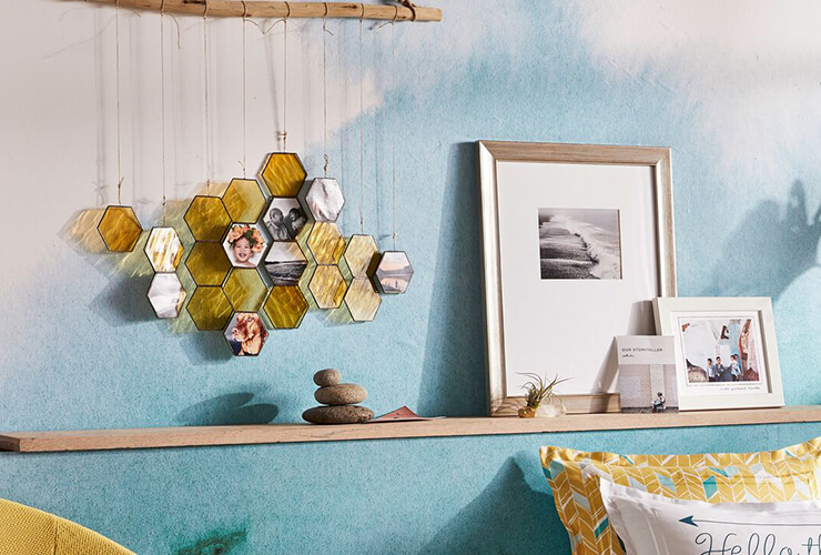 A honeycomb hanging display hold photos