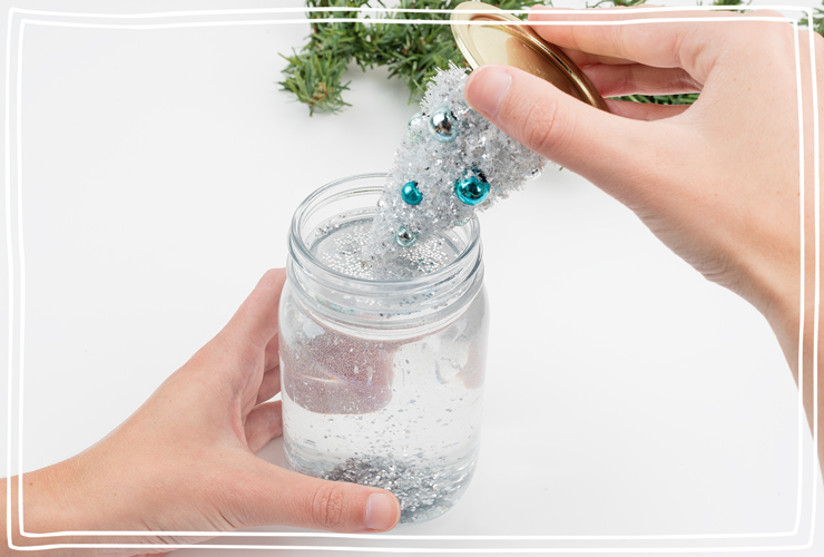 Add ornament and lid to mason jar