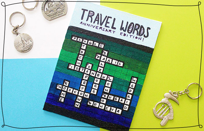 travel crossword puzzle book on table
