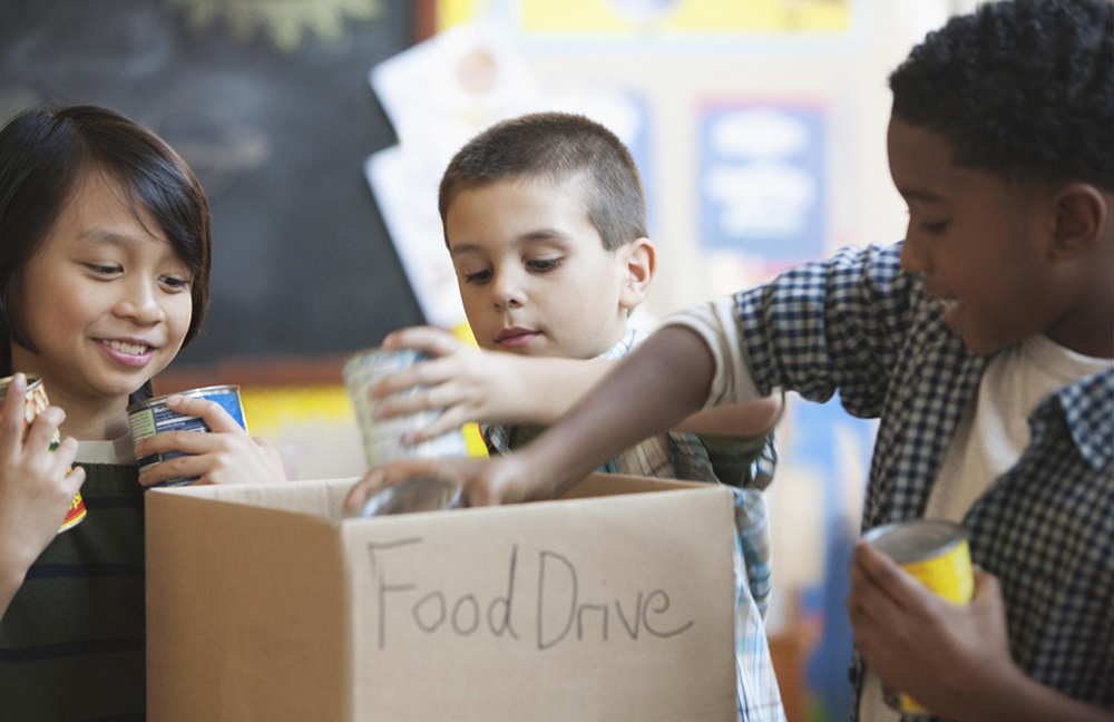 kids giving back at food drive