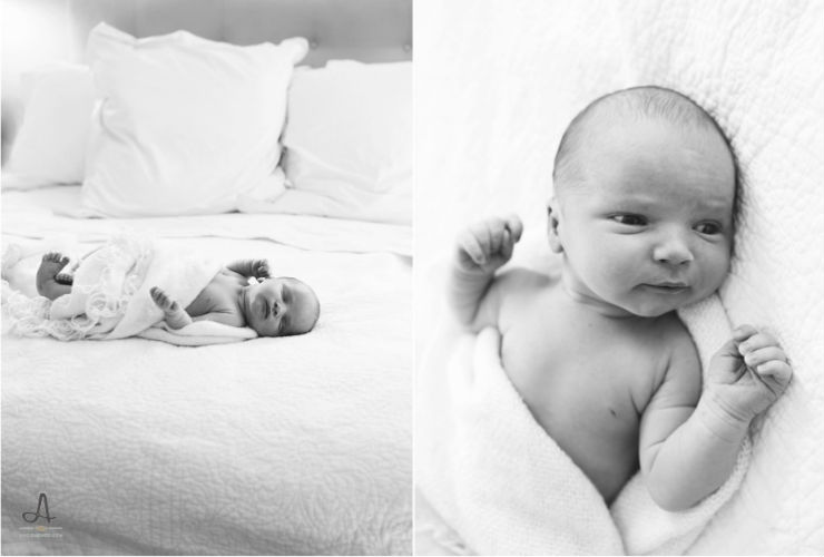 baby laying on a bed