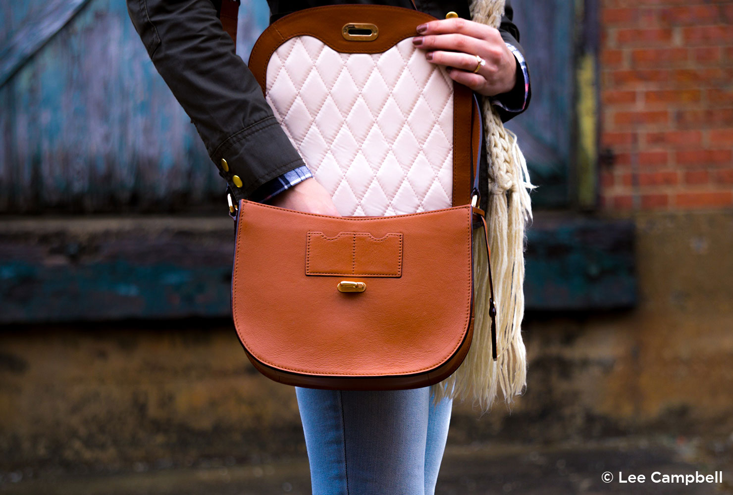 girl with brown purse